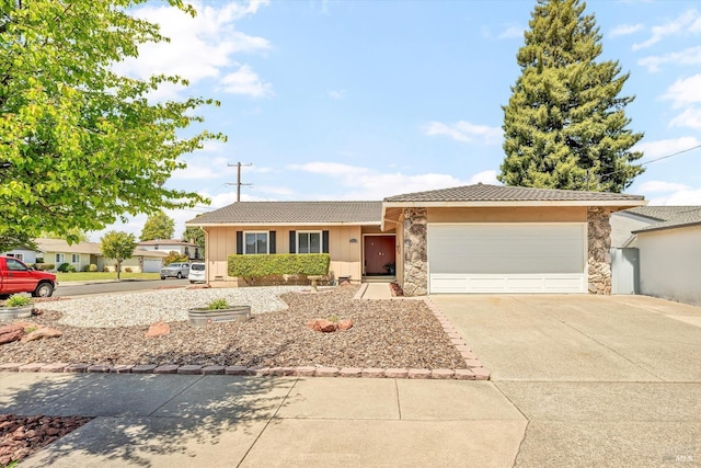 2464 Maclennan St, Napa, CA 94558 - ranch-style house featuring concrete driveway, stone siding, a garage, and a tiled roof