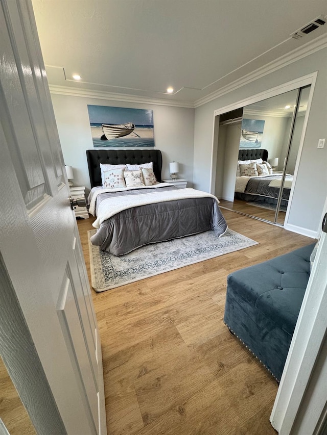 4647 Barbee Way, Sacramento, CA 95823 - bedroom with ornamental molding, wood finished floors, recessed lighting, and a closet