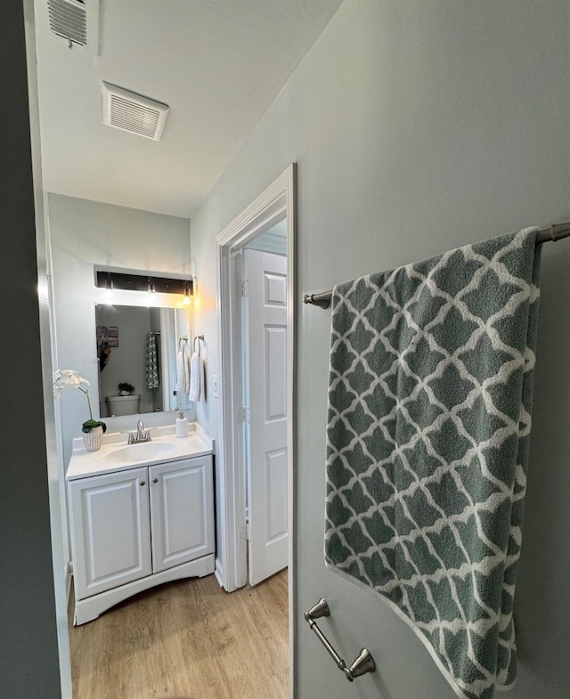 4647 Barbee Way, Sacramento, CA 95823 - bathroom with wood finished floors and vanity