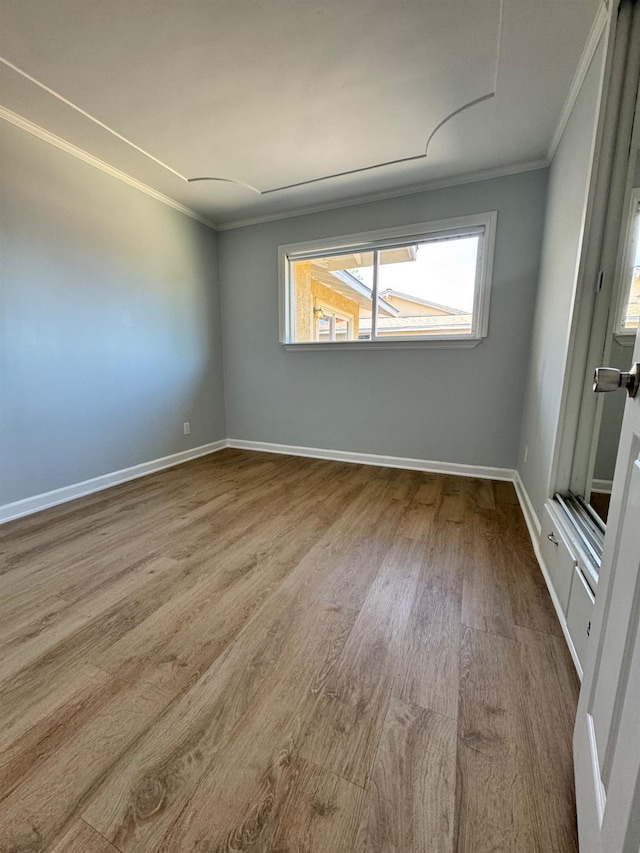 4647 Barbee Way, Sacramento, CA 95823 - spare room with crown molding and wood finished floors