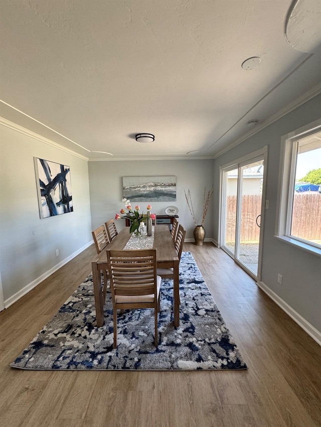 4647 Barbee Way, Sacramento, CA 95823 - dining space with ornamental molding and wood finished floors