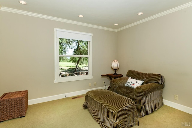 sitting room featuring crown molding, carpet flooring, baseboards, and recessed lighting
