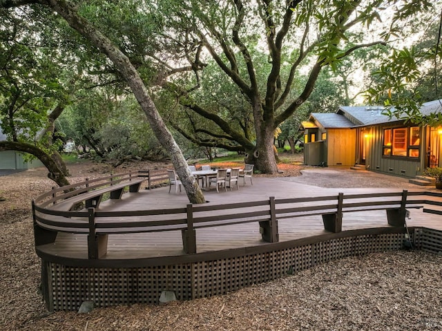 deck featuring a hot tub