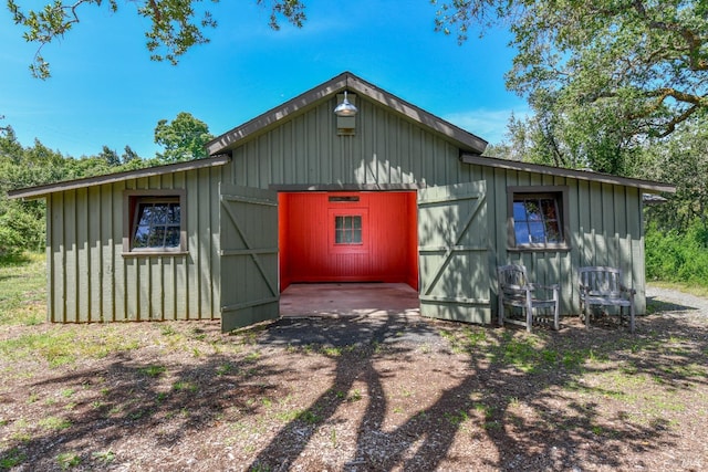 view of outbuilding featuring an outdoor structure