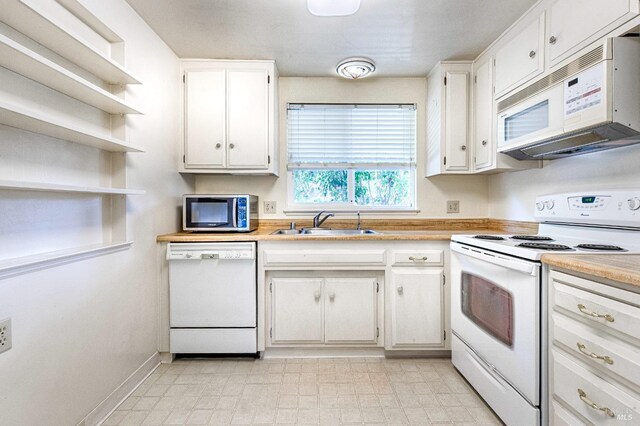 4 Valley Green St, Santa Rosa, CA 95409 - kitchen with light countertops, white cabinets, and white appliances