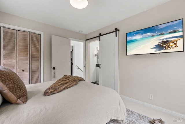 269 Castro St, Lagunitas, CA 94938 - bedroom with baseboards, carpet, a closet, and a barn door