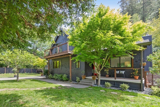269 Castro St, Lagunitas, CA 94938 - view of front facade featuring fence, a balcony, and a front yard