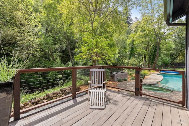 269 Castro St, Lagunitas, CA 94938 - deck featuring fence, a view of trees, and a fenced in pool