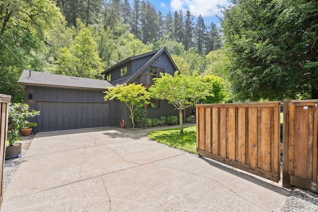 269 Castro St, Lagunitas, CA 94938 - exterior space featuring a garage, fence, and driveway