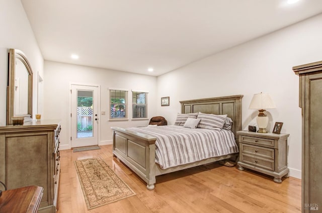 bedroom featuring baseboards, access to outside, recessed lighting, and light wood-style flooring
