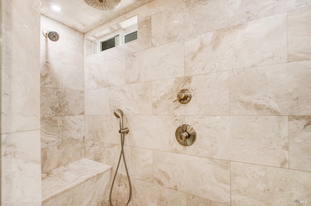 details with a tile shower