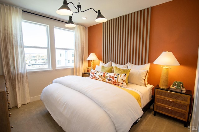 bedroom featuring carpet flooring and baseboards