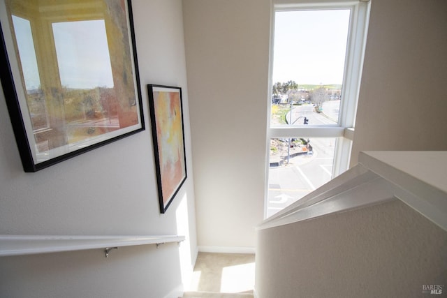stairs featuring baseboards