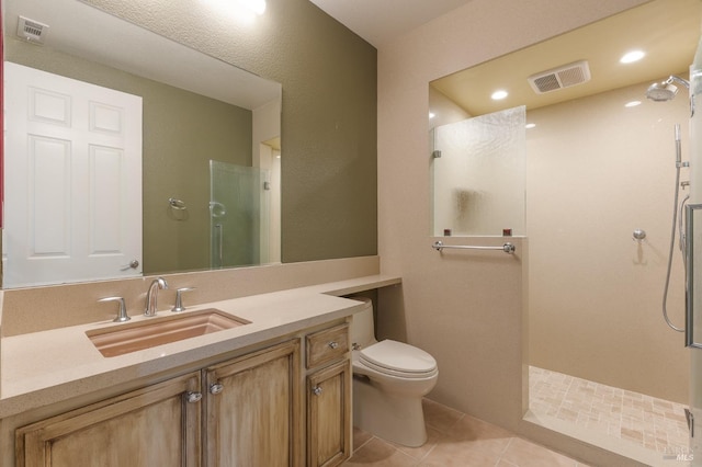 full bathroom with visible vents, a walk in shower, tile patterned flooring, and toilet