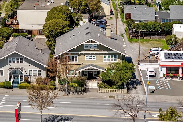 birds eye view of property with a residential view