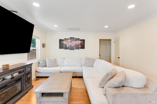 1034 Caldwell Ave, Vallejo, CA 94591 - living area with crown molding, recessed lighting, visible vents, and light wood-type flooring