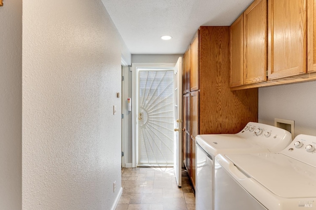 1034 Caldwell Ave, Vallejo, CA 94591 - clothes washing area featuring washing machine and clothes dryer, cabinet space, baseboards, a textured wall, and recessed lighting