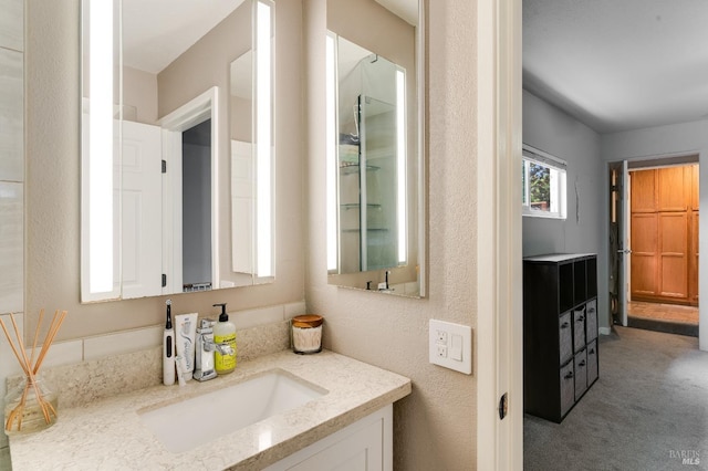 1034 Caldwell Ave, Vallejo, CA 94591 - bathroom featuring vanity and a textured wall