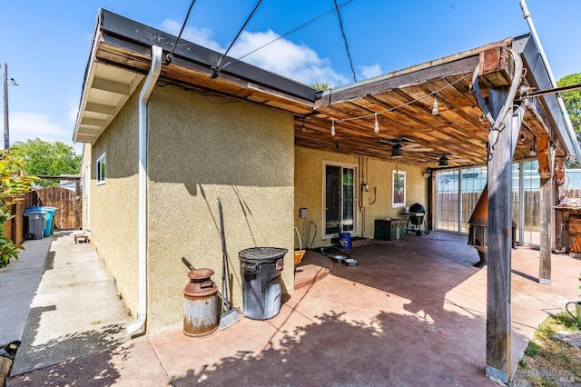 1034 Caldwell Ave, Vallejo, CA 94591 - rear view of house featuring a patio area, stucco siding, and fence