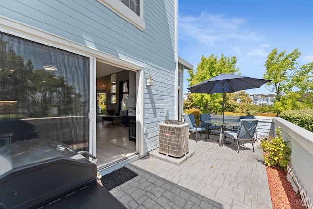 view of patio with central AC and grilling area