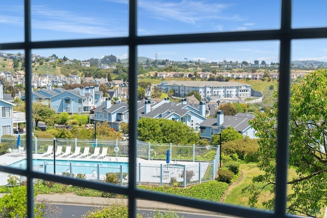 exterior space featuring a swimming pool