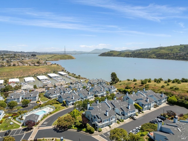 aerial view with a water view and a residential view