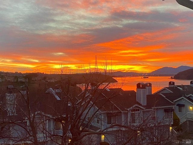 property's view of city featuring a mountain view