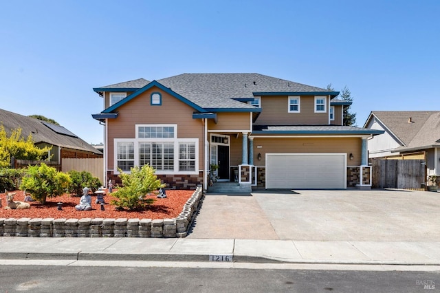 1216 Hermitage Way, Rohnert Park, CA 94928 - traditional home with an attached garage, fence, driveway, and stone siding