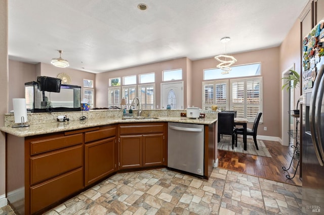 1216 Hermitage Way, Rohnert Park, CA 94928 - kitchen featuring stainless steel dishwasher, pendant lighting, a wealth of natural light, and a sink
