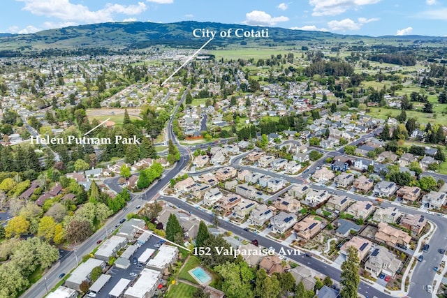 birds eye view of property featuring a residential view and a mountain view