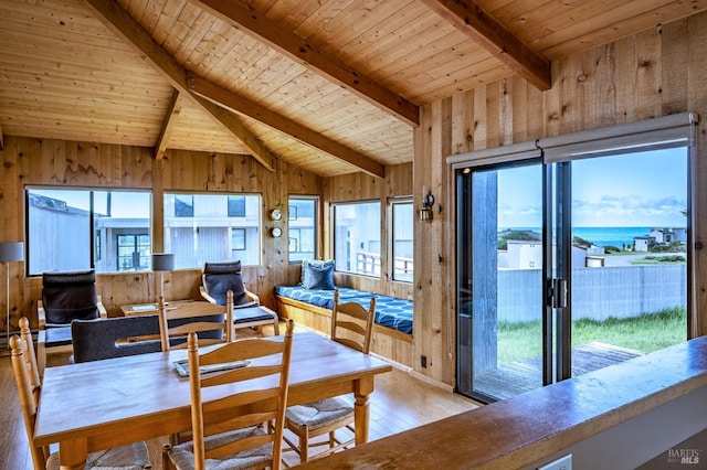 360 Grey Whale, The Sea Ranch, CA 95497 - dining room featuring wood-type flooring, wooden walls, and a wealth of natural light