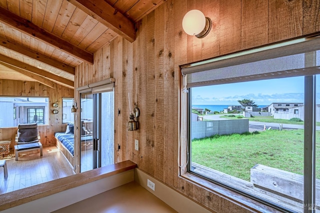 360 Grey Whale, The Sea Ranch, CA 95497 - doorway to outside with wood ceiling, lofted ceiling with beams, wood walls, and wood finished floors