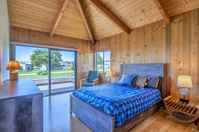 360 Grey Whale, The Sea Ranch, CA 95497 - bedroom featuring wooden walls, access to outside, hardwood / wood-style flooring, wooden ceiling, and lofted ceiling with beams