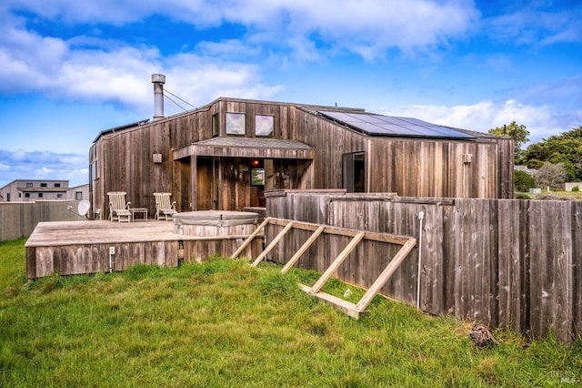 360 Grey Whale, The Sea Ranch, CA 95497 - rear view of property with a lawn, fence, and a deck
