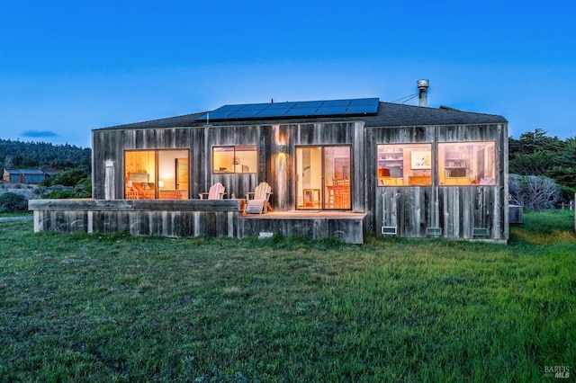 360 Grey Whale, The Sea Ranch, CA 95497 - rear view of property with roof mounted solar panels and a yard