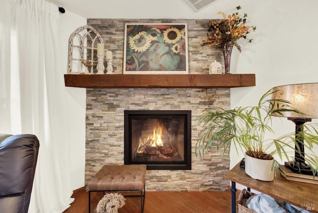 interior details featuring wood finished floors and visible vents