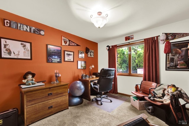 carpeted home office with visible vents