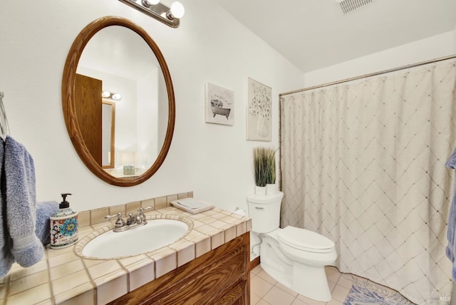 full bath featuring visible vents, vanity, curtained shower, toilet, and tile patterned floors
