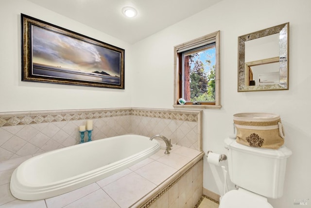 full bathroom featuring a garden tub and toilet