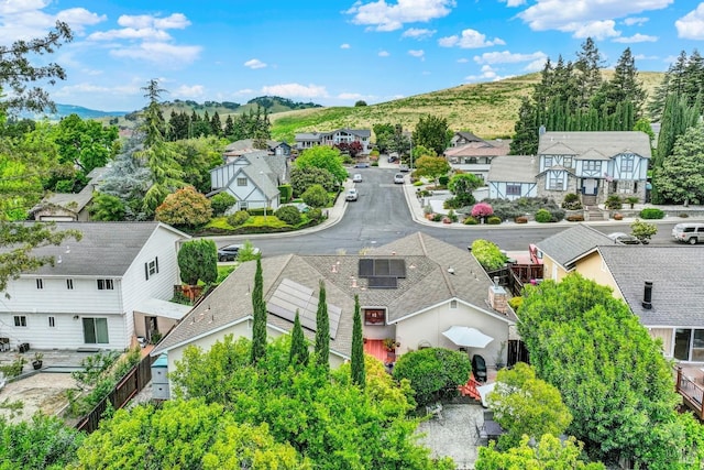 drone / aerial view with a mountain view and a residential view