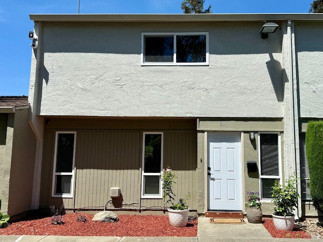 view of front of home featuring stucco siding