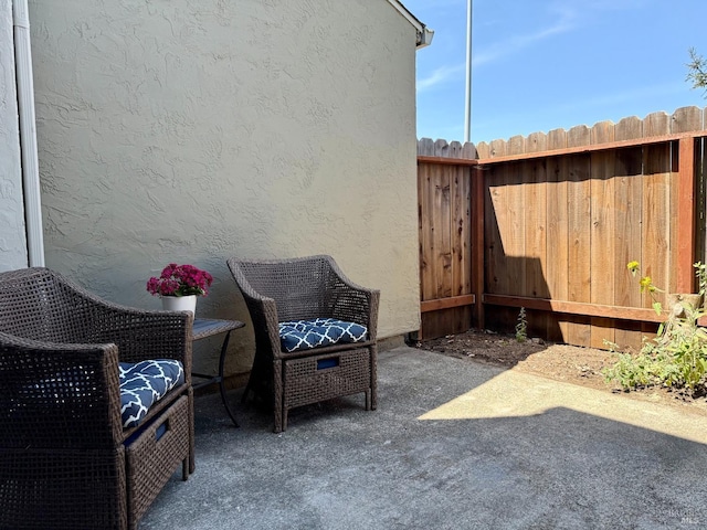 view of patio / terrace with fence