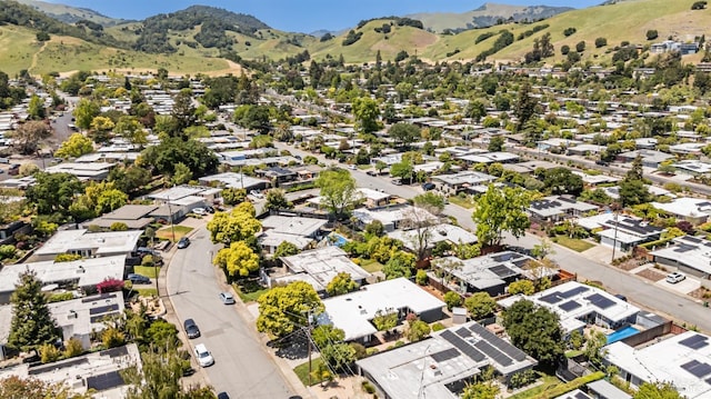 aerial view featuring a residential view and a mountain view