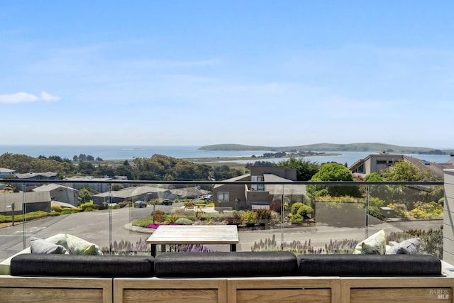 exterior space with a water view
