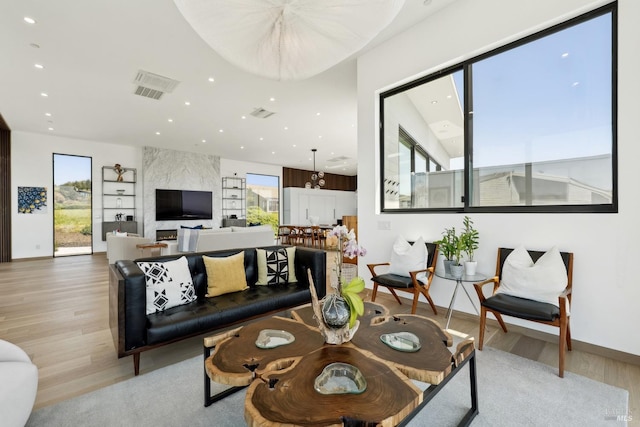 living room with recessed lighting and wood finished floors