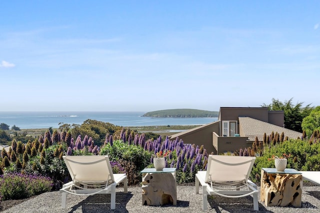 view of patio / terrace featuring a water view