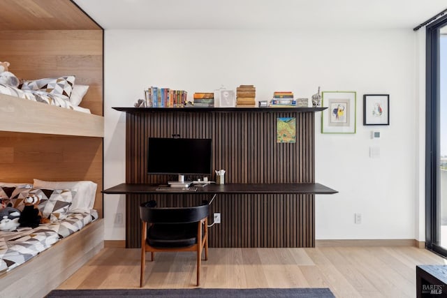 office area with wood finished floors