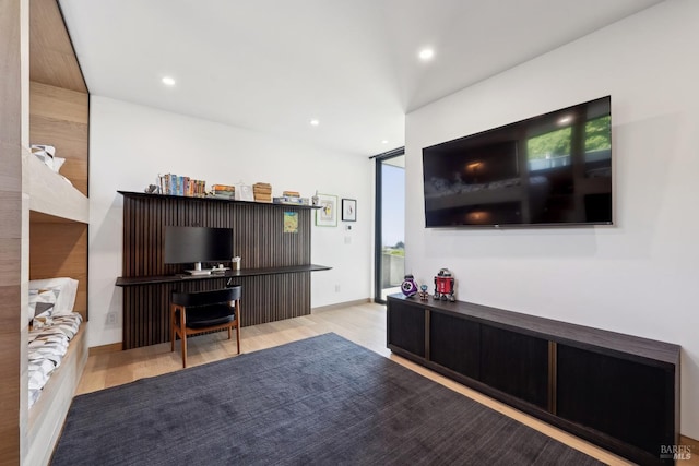 living room featuring recessed lighting and wood finished floors