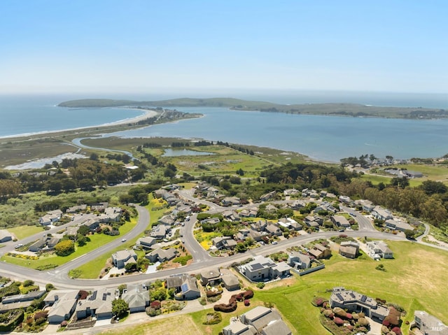 bird's eye view featuring a residential view and a water view