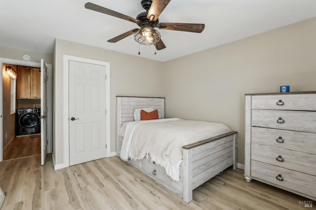 bedroom with light wood-type flooring, baseboards, and ceiling fan
